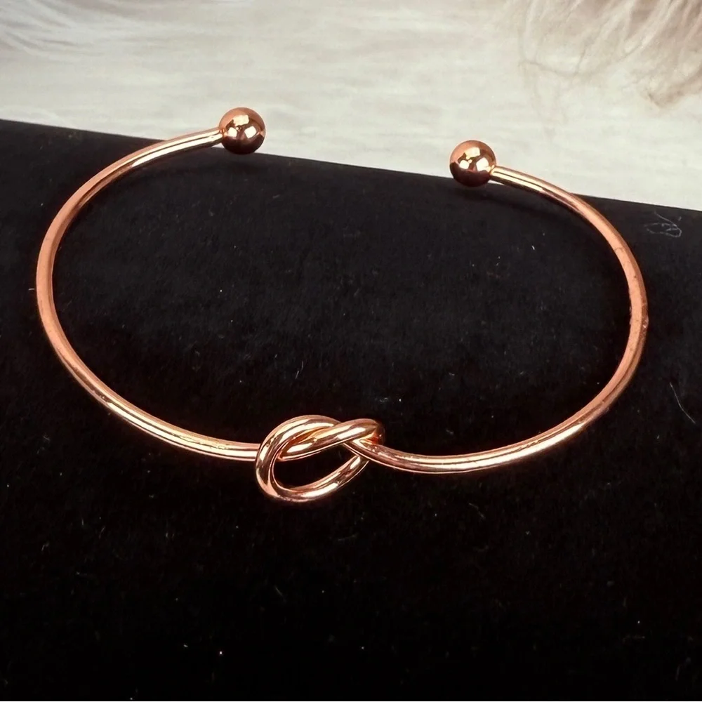 Pretty rose goldtone knotted minimalist cuff bracelet